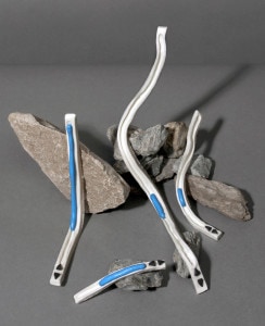 four-clay-scrollbars-and-several-rocks_rachel-de-joode_2012